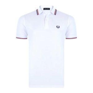 Polo Fred Perry classic, blanco con líneas de contraste rojo y azul marino en cuello y mangas. Si buscas comprar polo Fred Perry Barato, ¡es aquí, en Breakaway!